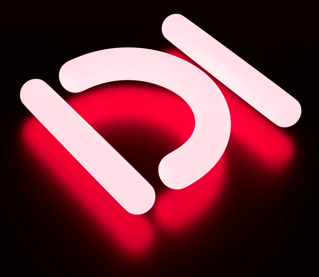 Dive logo in three dimensional space and laying down on a very reflective surface. The logo glow illuminates the immediate area surrounding it.